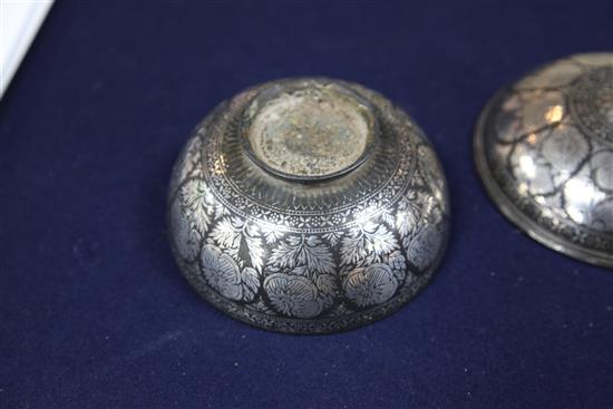 A Indian silver-inlaid Bidri ware magic bowl and cover (abkhwura), Deccan, late 18th/early 19th century, diameter 5.1in.